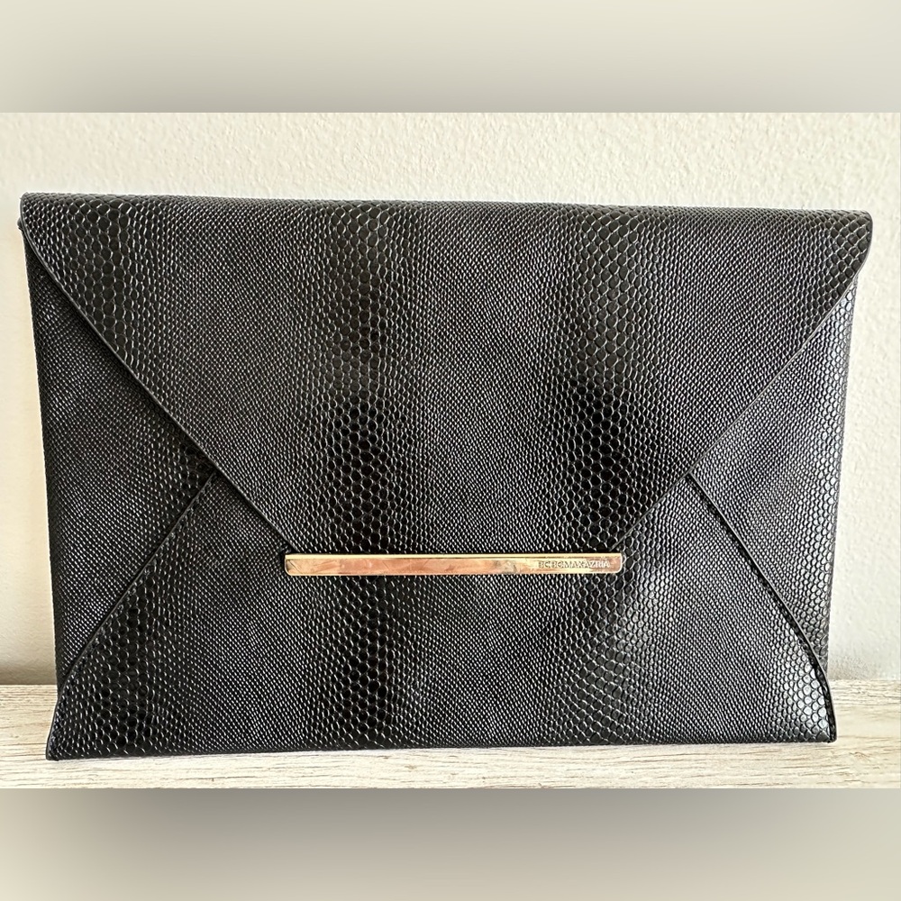 BCBGMaxAzria Black Textured Envelope Clutch with Gold Accent